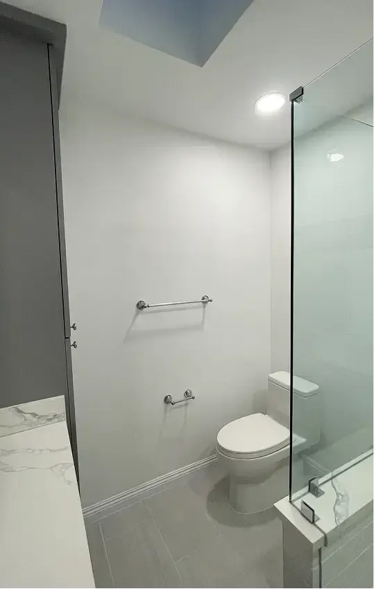 bathroom with a white toilet